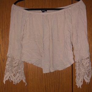 Medium Ambiance cream-colored off the shoulder top